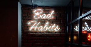 bad habits neon sign