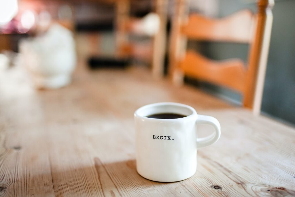 I am not good enough - mug of coffee on wooden table
